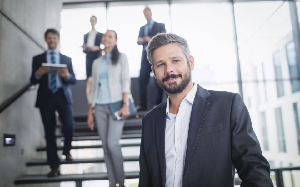 business leader on stairs